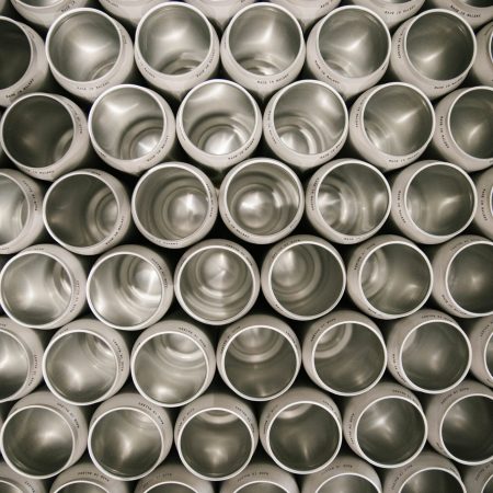 empty cans arranged in a clump